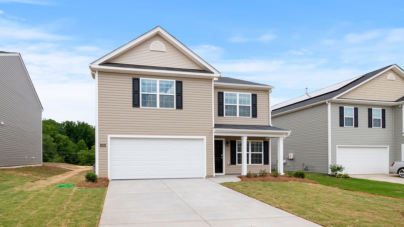 Two-story house with a driveway in a suburban Atlanta-area subdivision